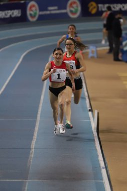 ISTANBUL, TURKEY - MARCH 05, 2022: Athletes running during Balkan Athletics Indoor Championships in Atakoy Athletics Arena