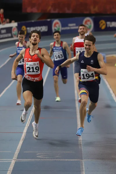 stock image ISTANBUL, TURKEY - MARCH 05, 2022: Athletes running during Balkan Athletics Indoor Championships in Atakoy Athletics Arena