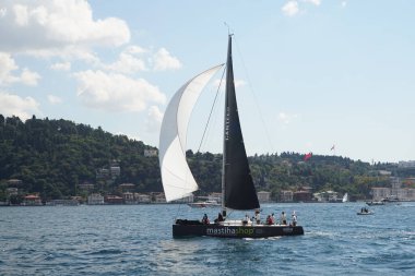 ISTANBUL, TURKIYE - SEPTEMBER 24, 2022: Sailboat competing in Bosphorus Cup