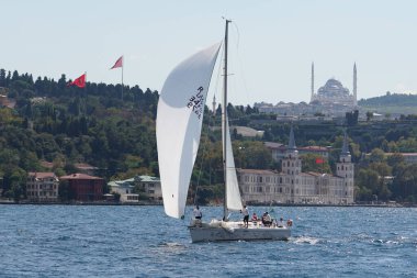 ISTANBUL, TURKIYE - SEPTEMBER 24, 2022: Sailboat competing in Bosphorus Cup
