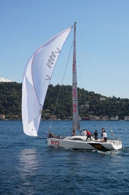 ISTANBUL, TURKIYE - SEPTEMBER 24, 2022: Sailboat competing in Bosphorus Cup