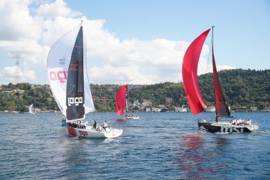 ISTANBUL, TURKIYE - SEPTEMBER 24, 2022: Sailboats competing in Bosphorus Cup
