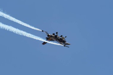 KONYA, TURKIYE - JUNE 30, 2022: Turkish Air Force General Dynamics F-16C Fighting Falcon SoloTurk (4R-23) aerobatic demonstrate over Konya Airport during Anatolian Eagle Air Force Exercise