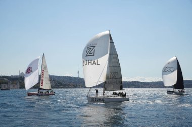 ISTANBUL, TURKIYE - SEPTEMBER 24, 2022: Sailboats competing in Bosphorus Cup