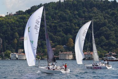 ISTANBUL, TURKIYE - SEPTEMBER 24, 2022: Sailboats competing in Bosphorus Cup