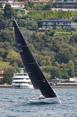 ISTANBUL, TURKIYE - SEPTEMBER 24, 2022: Sailboat competing in Bosphorus Cup