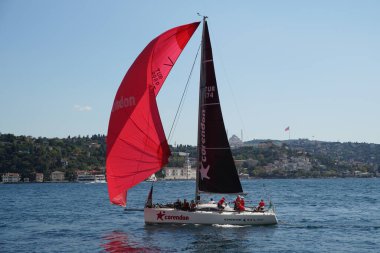 ISTANBUL, TURKIYE - SEPTEMBER 24, 2022: Sailboat competing in Bosphorus Cup