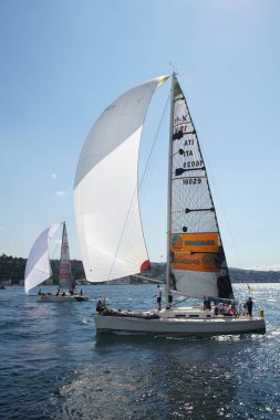 ISTANBUL, TURKIYE - SEPTEMBER 24, 2022: Sailboats competing in Bosphorus Cup