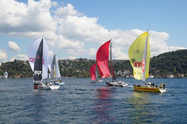 ISTANBUL, TURKIYE - SEPTEMBER 24, 2022: Sailboats competing in Bosphorus Cup