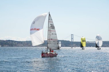 ISTANBUL, TURKIYE - SEPTEMBER 24, 2022: Sailboat competing in Bosphorus Cup