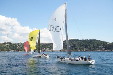 ISTANBUL, TURKIYE - SEPTEMBER 24, 2022: Sailboats competing in Bosphorus Cup