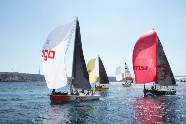 ISTANBUL, TURKIYE - SEPTEMBER 24, 2022: Sailboats competing in Bosphorus Cup