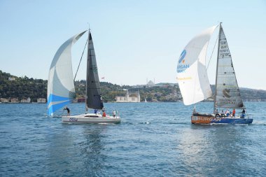 ISTANBUL, TURKIYE - SEPTEMBER 24, 2022: Sailboats competing in Bosphorus Cup