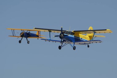 ESKISEHIR, TURKIYE - SEPTEMBER 18, 2022: M.S.O Air and Space Museum Antonov An-2T and Boeing Stearman Model 75 display in Sivrihisar SHG Airshow