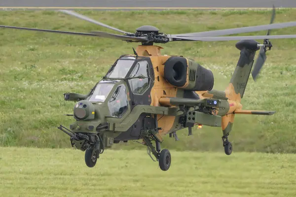 stock image ISTANBUL, TURKIYE - APRIL 29, 2023: Turkish Army TAI T-129A ATAK displayed at Istanbul Ataturk Airport during Teknofest Istanbul