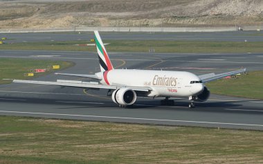 ISTANBUL, TURKIYE - OCTOBER 01, 2022: Emirates SkyCargo Boeing 777-F1H (42231) landing to Istanbul International Airport