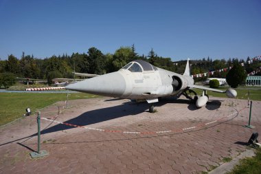 ESKISEHIR, TURKIYE - SEPTEMBER 17, 2023: Turkish Air Force Lockheed F-104G Starfighter (7190) displayed at Vecihi Hurkus Aviation Park clipart