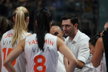ISTANBUL, TURKIYE - OCTOBER 25, 2023: Eczacibasi Dynavit coach Ferhat Akbas in Vakifbank Turkish Sultans League match in Vakifbank Sport Hall clipart