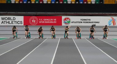 ISTANBUL, TURKIYE - JANUARY 13, 2024: Athletes running 60 metres during Turkish Athletic Federation Olympic Threshold Competitions in Atakoy Athletics Arena clipart