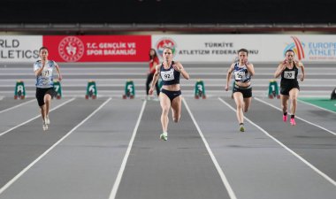 ISTANBUL, TURKIYE - JANUARY 20, 2024: Athletes running 60 metres during Turkish Athletic Federation Olympic Threshold Competitions in Atakoy Athletics Arena clipart