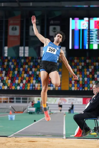 stock image ISTANBUL, TURKIYE - JANUARY 20, 2024: Undefined athlete long jumping during Turkish Athletic Federation Olympic Threshold Competitions in Atakoy Athletics Arena