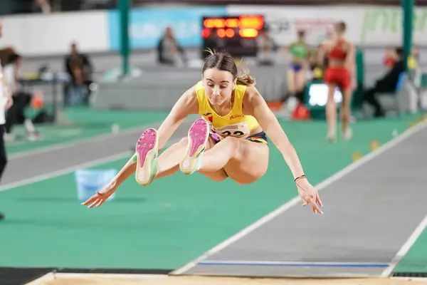 stock image ISTANBUL, TURKIYE - FEBRUARY 10, 2024: Undefined athlete long jumping during Balkan Athletics Championships in Atakoy Athletics Arena