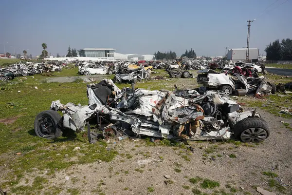 stock image HATAY, TURKIYE - FEBRUARY 26, 2024: Crushed Vehicles during 6 February 2023 Hatay Earthquakes