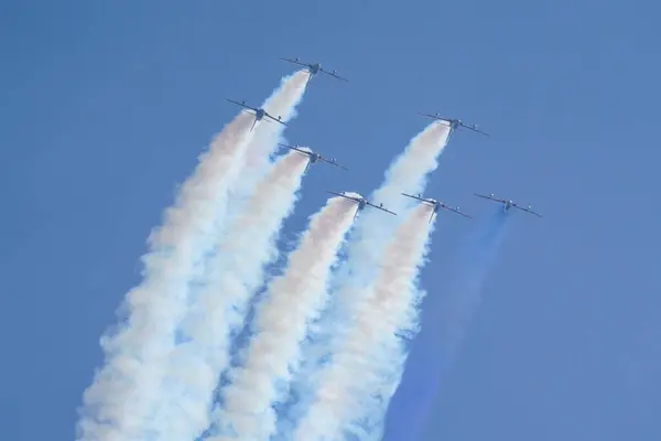 stock image ISTANBUL, TURKIYE - APRIL 30, 2023: Fursan Al Emarat, United Arab Emirates Air Force aerobatic demonstration team display in Istanbul Ataturk Airport during Teknofest Istanbul