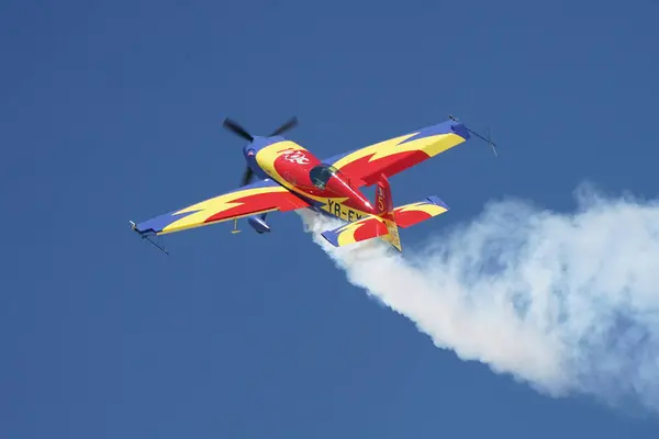 stock image ESKISEHIR, TURKIYE - SEPTEMBER 16, 2023: Romanian Hawks Aerobatics Team Extra 330SC (SC100) displayed at Sivrihisar SHG Airshow