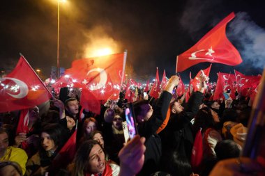 ISTANBUL, TURKIYE - MARCH 31, 2024: People Celebrate CHP Candidate Ekrem Imamoglu re-election clipart