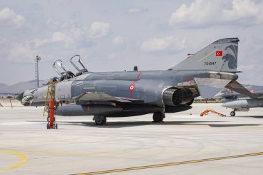 KONYA, TURKIYE - MAY 09, 2023: Turkish Air Force McDonnell Douglas F-4E Terminator 2020 (4683) display in Konya Airport during Anatolian Eagle Air Force Exercise clipart