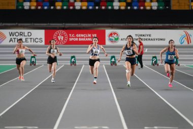 ISTANBUL, TURKIYE - FEBRUARY 17, 2024: Athletes running 60 metres during Turkish Indoor Athletics Championships in Atakoy Athletics Arena clipart