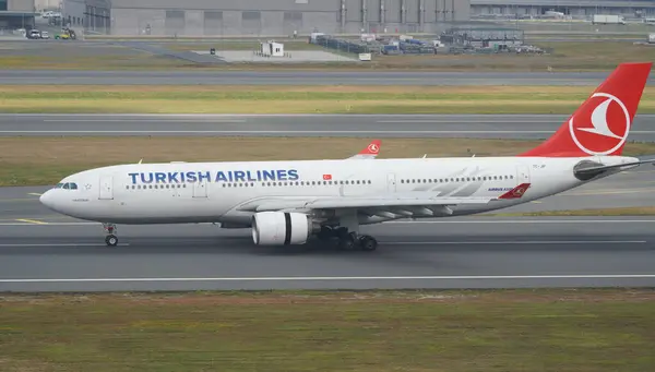 stock image ISTANBUL, TURKIYE - JUNE 17, 2023: Turkish Airlines Airbus A330-223 (876) landing to Istanbul International Airport