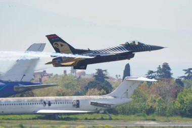 ISTANBUL, TURKIYE - MAY 01, 2023: SOLOTURK, Turkish Air Force General Dynamics F-16C Fighting Falcon display in Istanbul Ataturk Airport during Teknofest Istanbul clipart