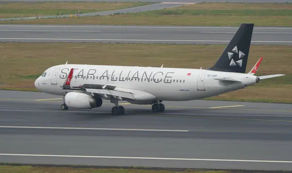 stock image ISTANBUL, TURKIYE - JUNE 17, 2023: Turkish Airlines Airbus A320-232 (3603) landing to Istanbul International Airport