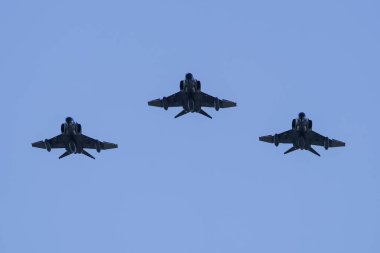 ISTANBUL, TURKIYE - JUNE 01, 2024: Turkish Air Force F-4s flying over Istanbul Aviation Museum during 113th anniversary of the foundation of the Turkish Air Force. clipart