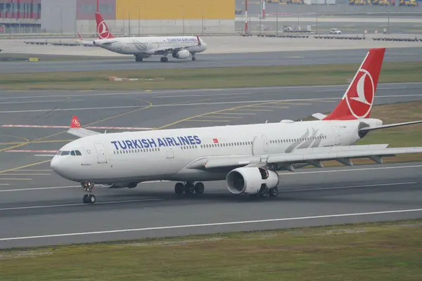 stock image ISTANBUL, TURKIYE - JUNE 17, 2023: Turkish Airlines Airbus A330-343X (1228) landing to Istanbul International Airport