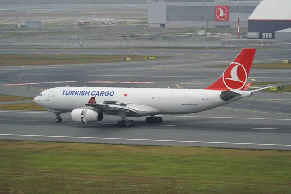 stock image ISTANBUL, TURKIYE - JUNE 17, 2023: Turkish Airlines Cargo Airbus A330-243F (1722) landing to Istanbul International Airport