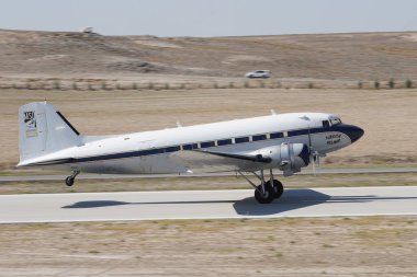 ESKISEHIR, TURKIYE - SEPTEMBER 16, 2023: M.S.O Air and Space Museum Douglas DC-3A (2204) displayed at Sivrihisar SHG Airshow clipart