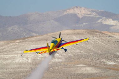 ESKISEHIR, TURKIYE - SEPTEMBER 16, 2023: Romanian Hawks Aerobatics Team Extra 330SC displayed at Sivrihisar SHG Airshow clipart