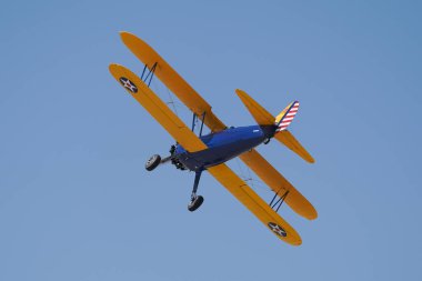 ESKISEHIR, TURKIYE - SEPTEMBER 17, 2023: M.S.O Air and Space Museum Boeing A75N1 Stearman (75-863) displayed at Sivrihisar SHG Airshow clipart