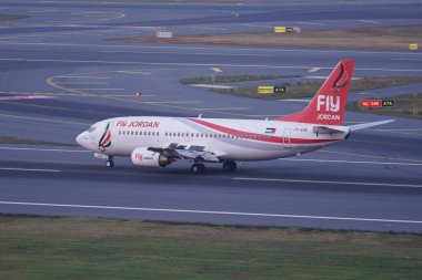 ISTANBUL, TURKIYE - JUNE 21, 2023: FlyJordan Boeing 737-33V (29342) landing to Istanbul International Airport clipart