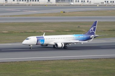 ISTANBUL, TURKIYE - SEPTEMBER 02, 2023: Air Montenegro Embraer 195LR (283) landing to Istanbul International Airport clipart