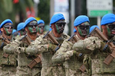 ISTANBUL, TURKIYE - AUGUST 30, 2024: Soldiers march during anniversary of 30 August Turkish Victory Day parade on Vatan Avenue clipart