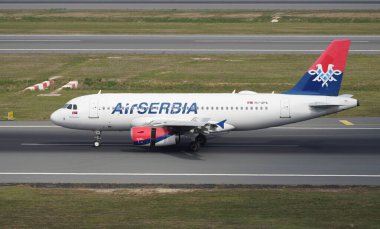 ISTANBUL, TURKIYE - SEPTEMBER 02, 2023: Air Serbia Airbus A319-132 (2277) landing to Istanbul International Airport clipart