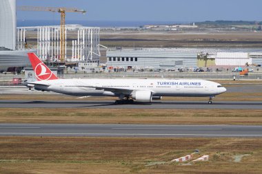 ISTANBUL, TURKIYE - JUNE 29, 2024: Turkish Airlines Boeing 777-3F2ER (44120) landing to Istanbul International Airport clipart