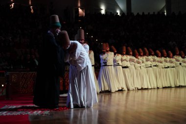 KONYA, TURKIYE - DECEMBER 14, 2024: Whirling Dervishes at Sema ceremony during Seb-i Arus, The Wedding Day in Konya City clipart