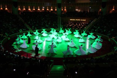 KONYA, TURKIYE - DECEMBER 14, 2024: Whirling Dervishes at Sema ceremony during Seb-i Arus, The Wedding Day in Konya City clipart