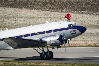 ESKISEHIR, TURKIYE - SEPTEMBER 22, 2024: Private Douglas DC-3A (2204) display in Sivrihisar SHG Airshow clipart