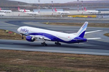 ISTANBUL, TURKIYE - JULY 11, 2024: Indigo Airlines Boeing 777-31HER (32729) take-off from Istanbul International Airport clipart